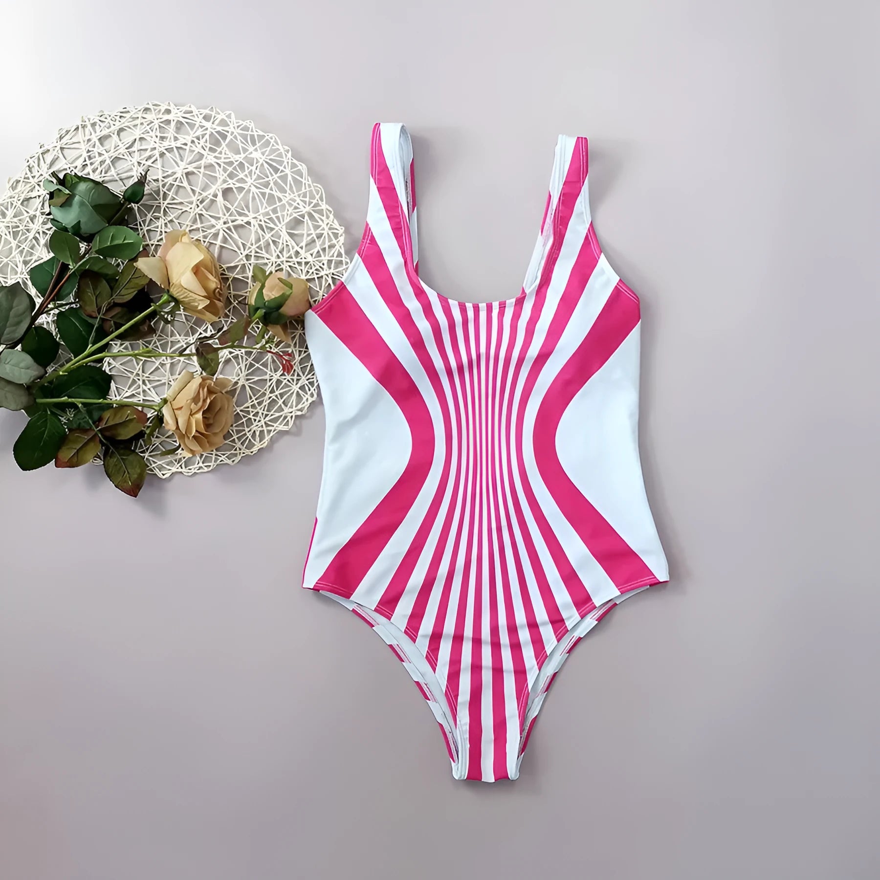 Pink striped women's one-piece swimsuit with digital print on front and back.