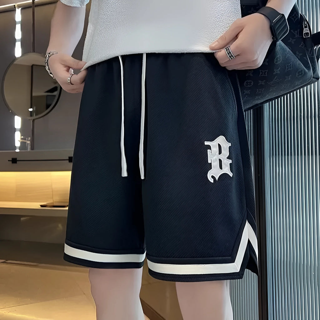 Men's loose straight wide leg sports shorts with low waist drawstring in polyester, fifth pants length