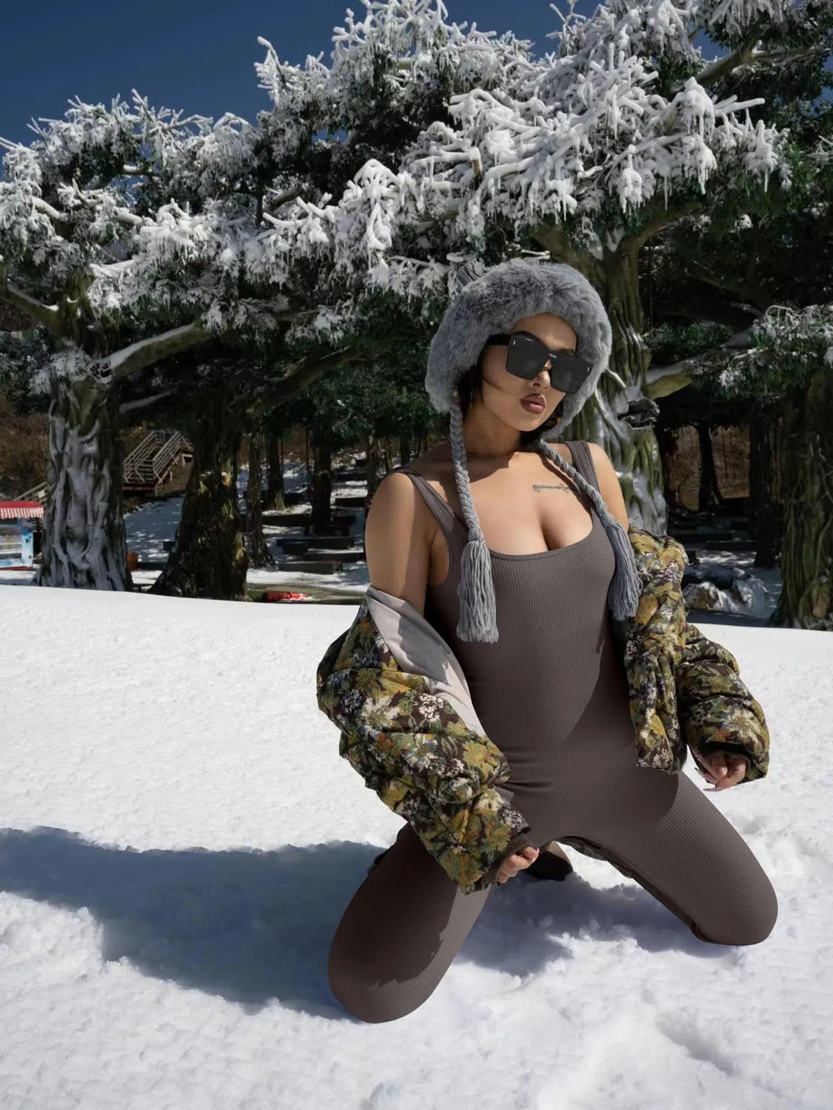 Women's long sleeve spandex suspender bodysuit tights with waist detail and button fastening.