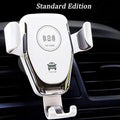 Black wireless car charger mounted on a car vent, holding an iPhone.
