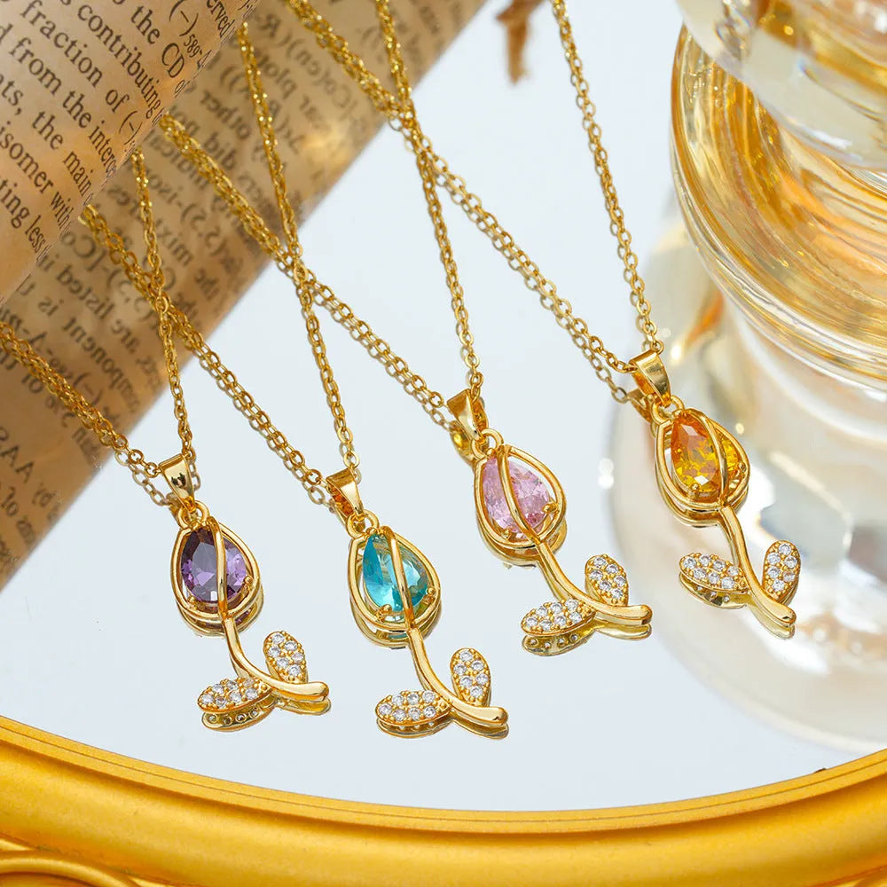 Women's zircon tulip necklace with electroplated finish on adjustable titanium steel chain showing floral pendant