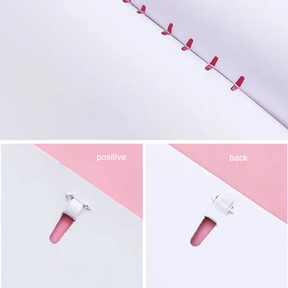 Compact stapler-free embossed paper binder in random colour on white background