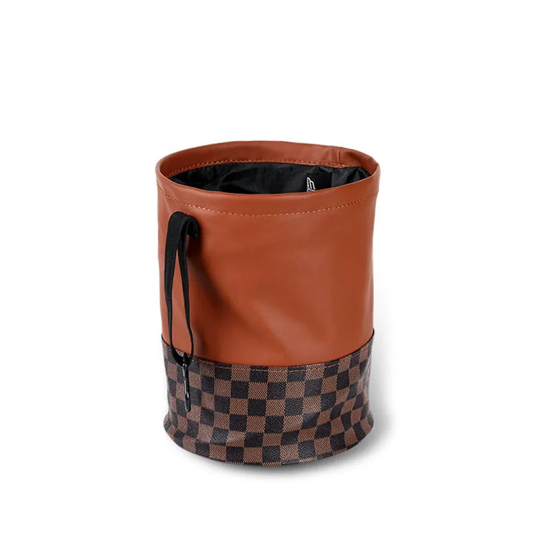 Leather retractable interior car bin with handle, shown in vehicle cabin setting