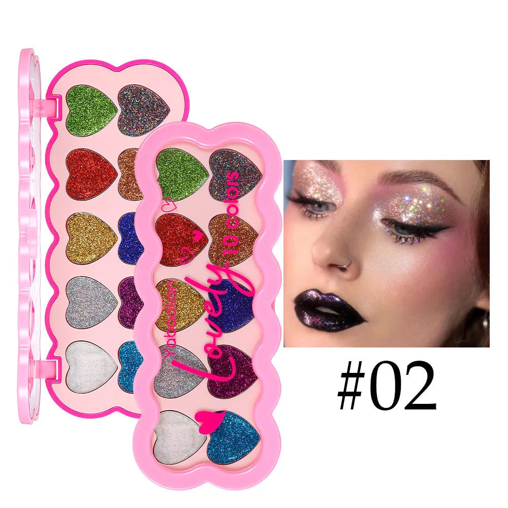 Ten-colour eye shadow palette with pearlescent heart and sequins finishes in a compact.