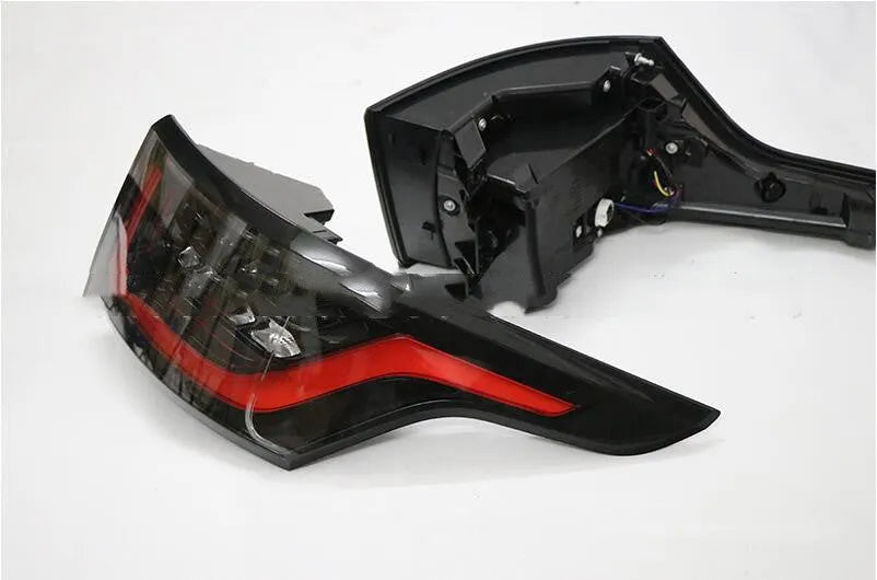 One pair of LED car brake lights for rear bumper mounting, IP66 waterproof rated.