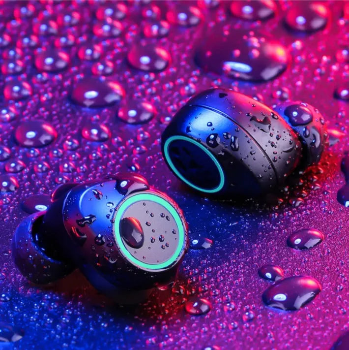 X9 wireless in-ear Bluetooth headset, black plastic, IPX7 waterproof, with charging bay.