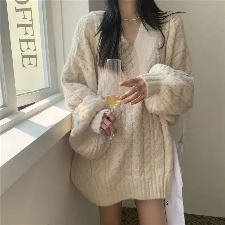 Thick knitted sleeveless sweater top with crocheted flower detail in loose fit free size polyest