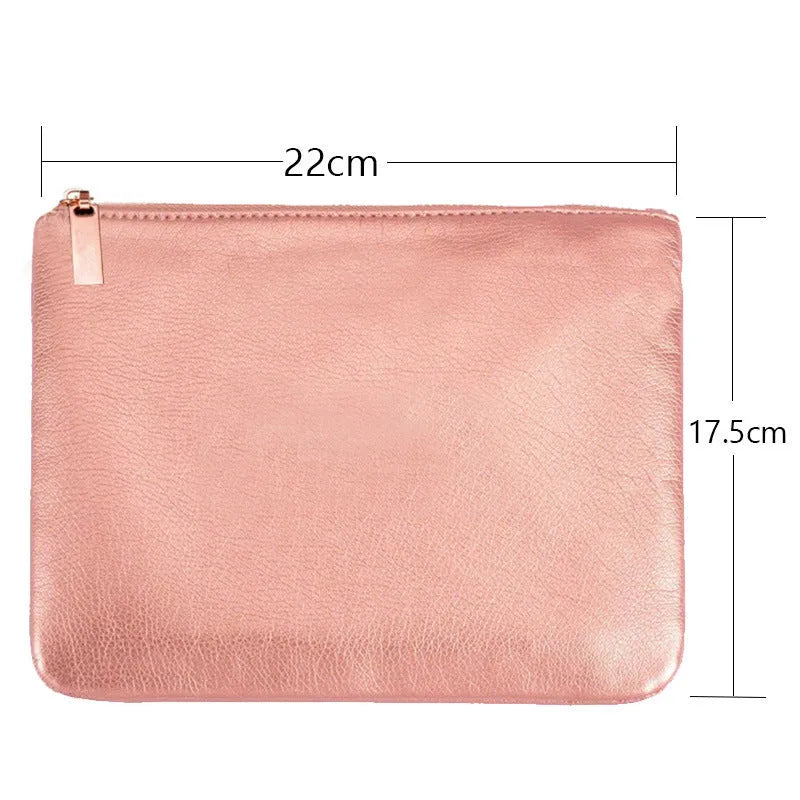 15-piece rose gold makeup brush set with bag, synthetic hair and wood handles on pink background