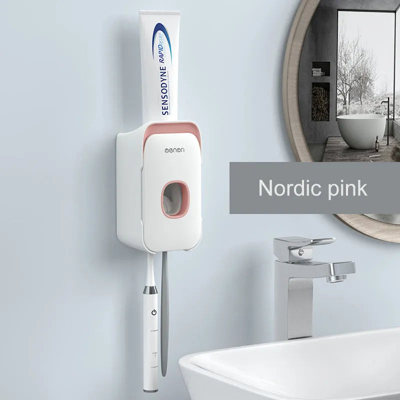 Wall-mounted automatic toothpaste dispenser in blue, grey, and pink colours