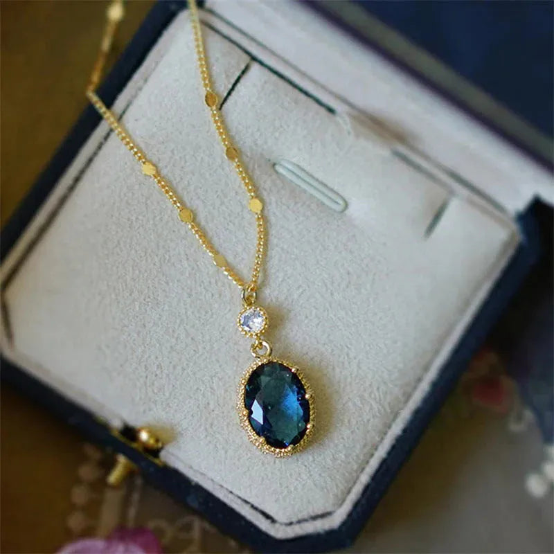 Gold geometric pendant necklace on chain with French retro design