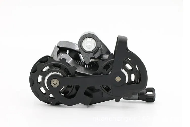 Road bike transmission kit with aluminium manual shift lever, front dial, and short leg rear derailleur.