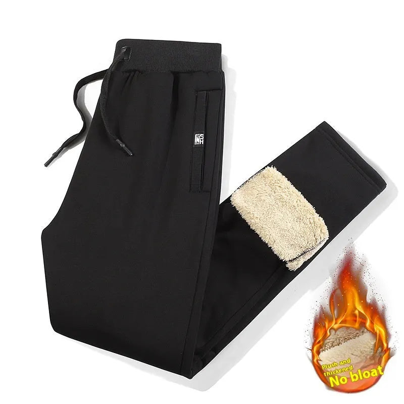 Men's gray fleece-lined oversized track pants with elastic waistband and straight leg