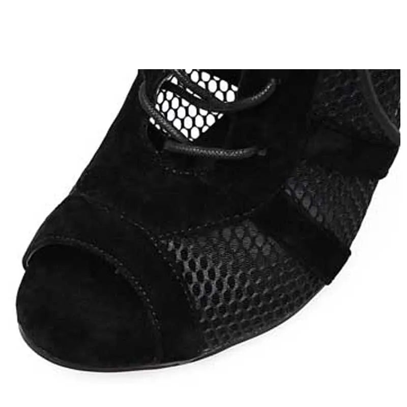 Black suede women's lace-up high heels with a high heel on a white background.