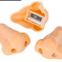 Flesh colour geometric plastic pencil sharpener with big nostril design measuring 58x45x30mm