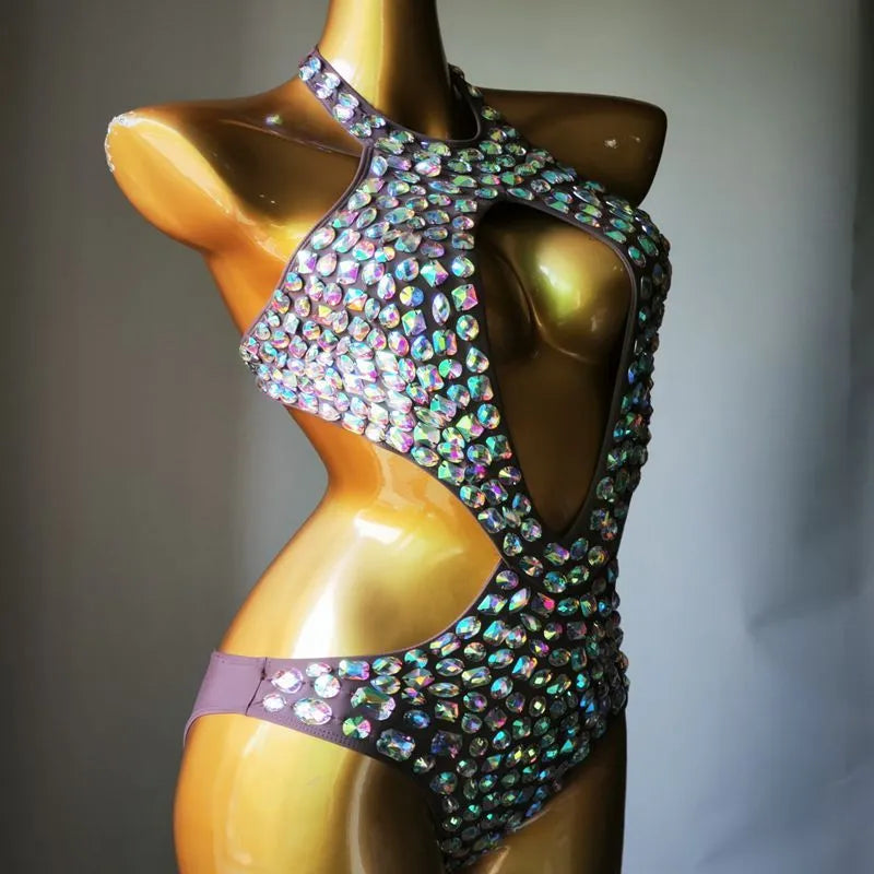 Women's black one-piece swimsuit with a diamond mesh pattern on the front.