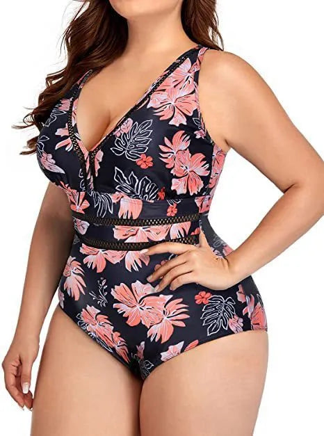 Black plus size women's swimsuit with all-over print pattern and mesh fabric stitching details