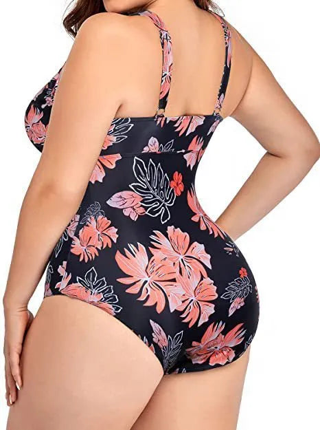 Black plus size women's swimsuit with all-over print pattern and mesh fabric stitching details