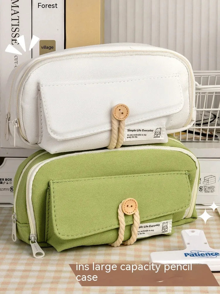 Korean-style canvas pencil case in green with capacity for approximately 80 pens