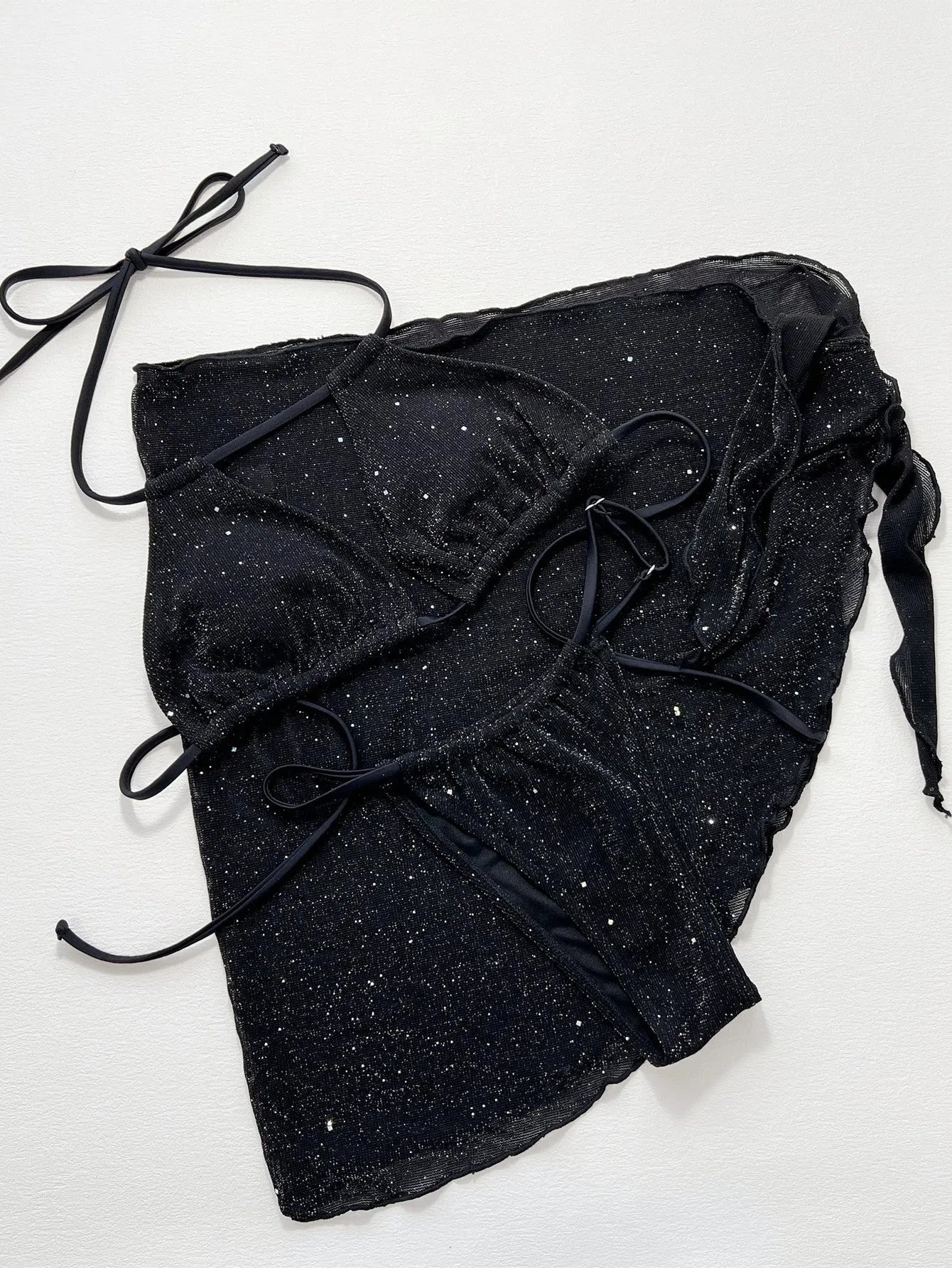 Black three piece bikini set with high waist shorts and top made of polyester fiber