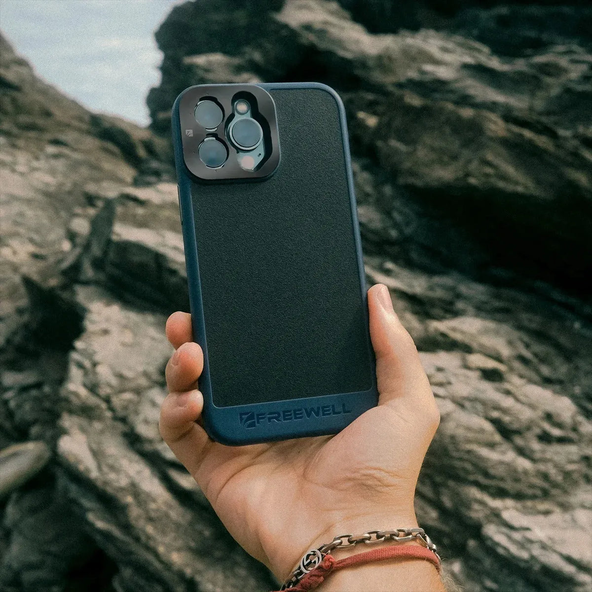 Black phone case compatible with iPhone 13 Pro through 15 Pro Max models