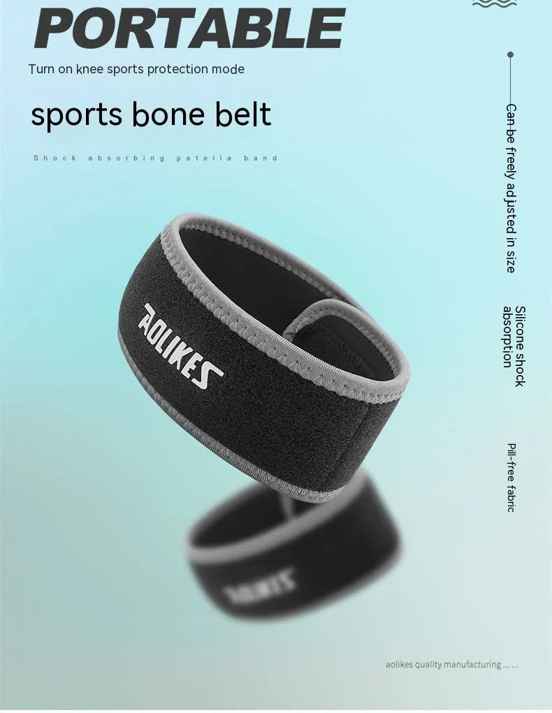 Black and grey patella retinaculum knee support for sports, showing wrap-around design.