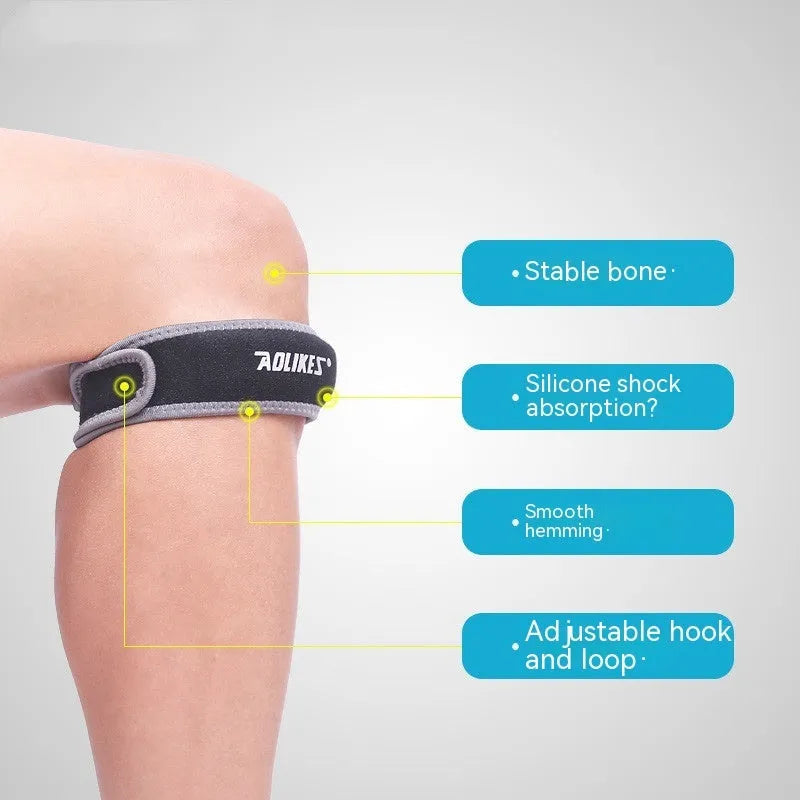 Black and grey patella retinaculum knee support for sports, showing wrap-around design.