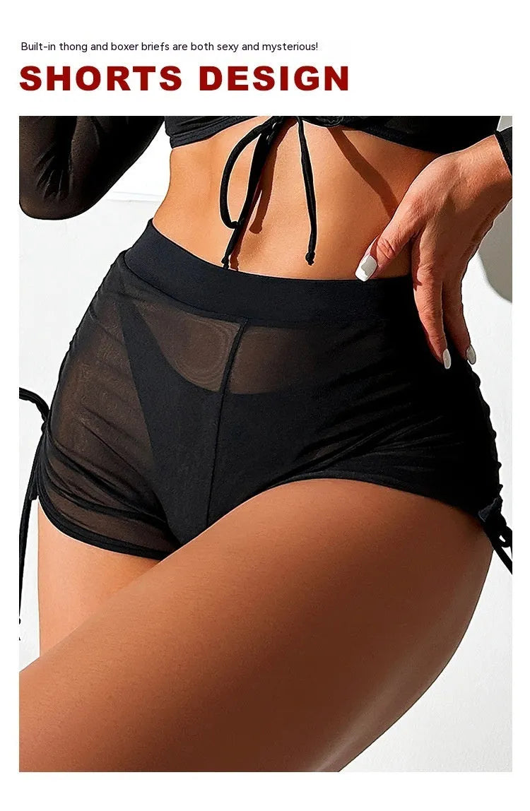 Black mesh long sleeve four-piece bikini set for women, laid flat showing top and briefs.