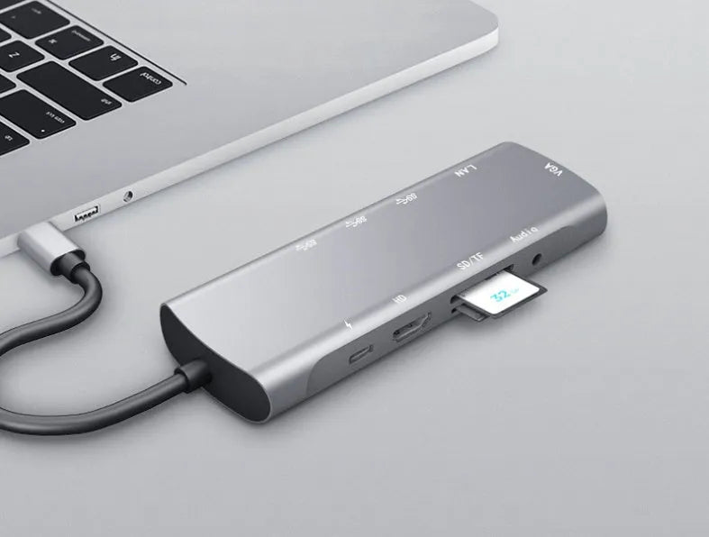 Grey aluminium USB-C docking station with HDMI, VGA, USB 3.0 ports and 140mm cable