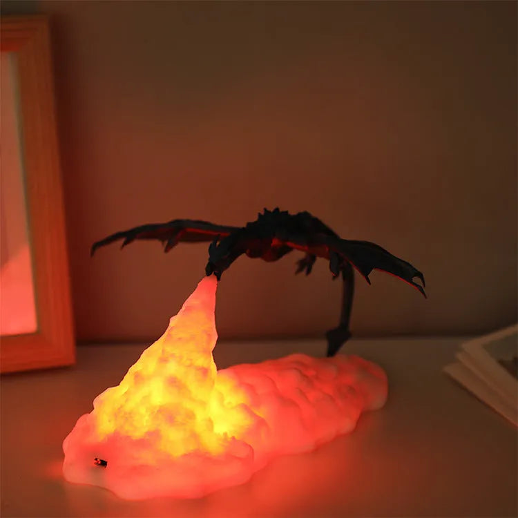 3D printed fire-breathing dragon night light with red glowing effect on a dark surface.
