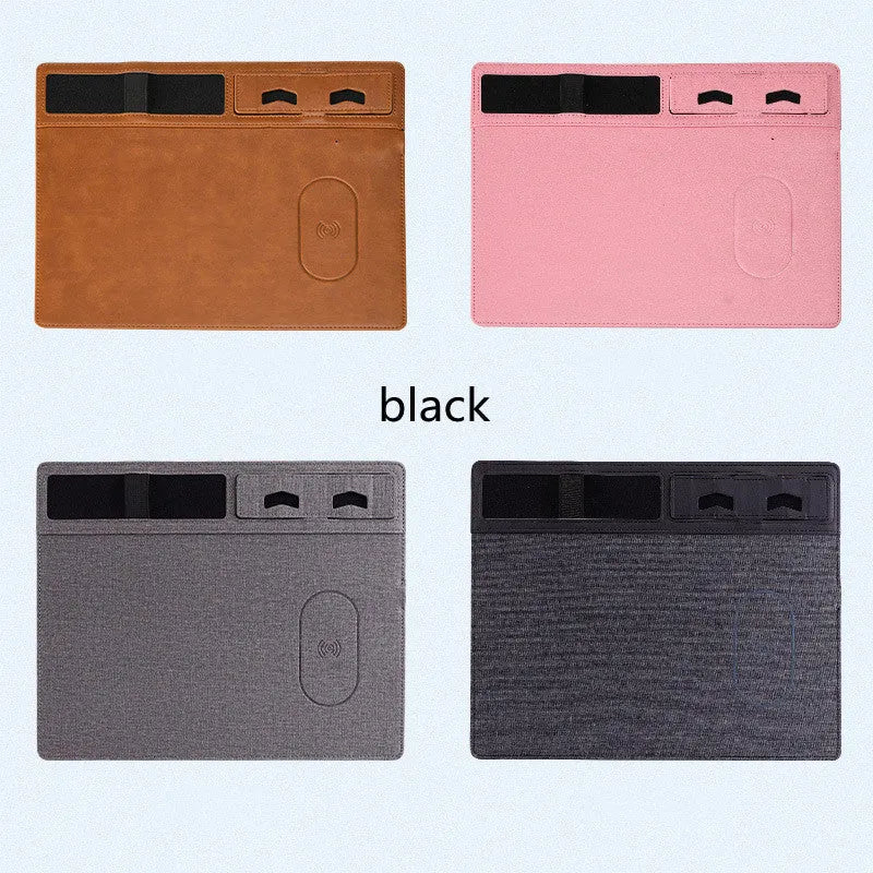 Pink wireless charging mouse pad with integrated mobile phone holder on a wooden desk
