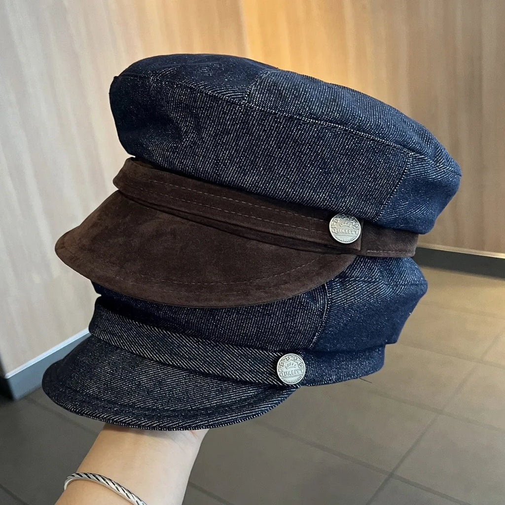 Dark blue denim newsboy hat with octagonal crown and contrasting brim