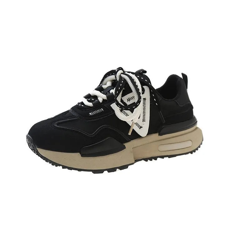 Women's black retro platform sports shoes with lace-up front and round toe on a rubber sole.