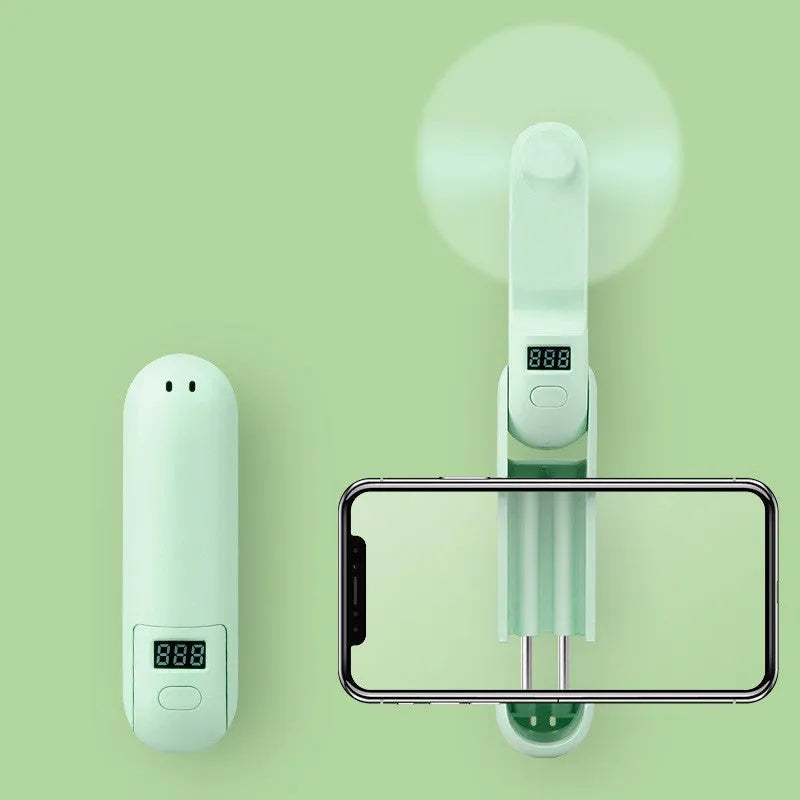 Folding mini USB fan showing collapsed blades and three colour options