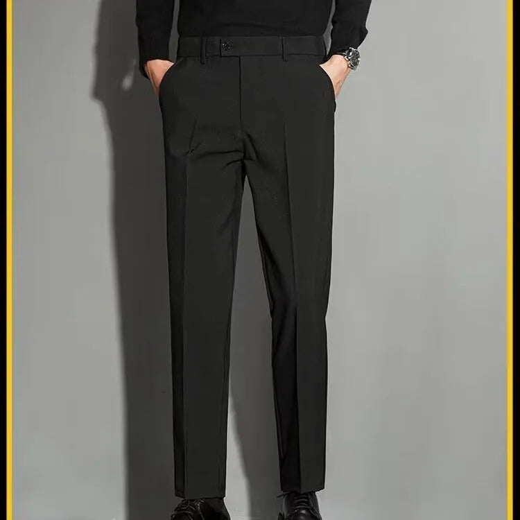 Men's straight leg suit trousers in chemical fibre blend fabric showing spring draping effect