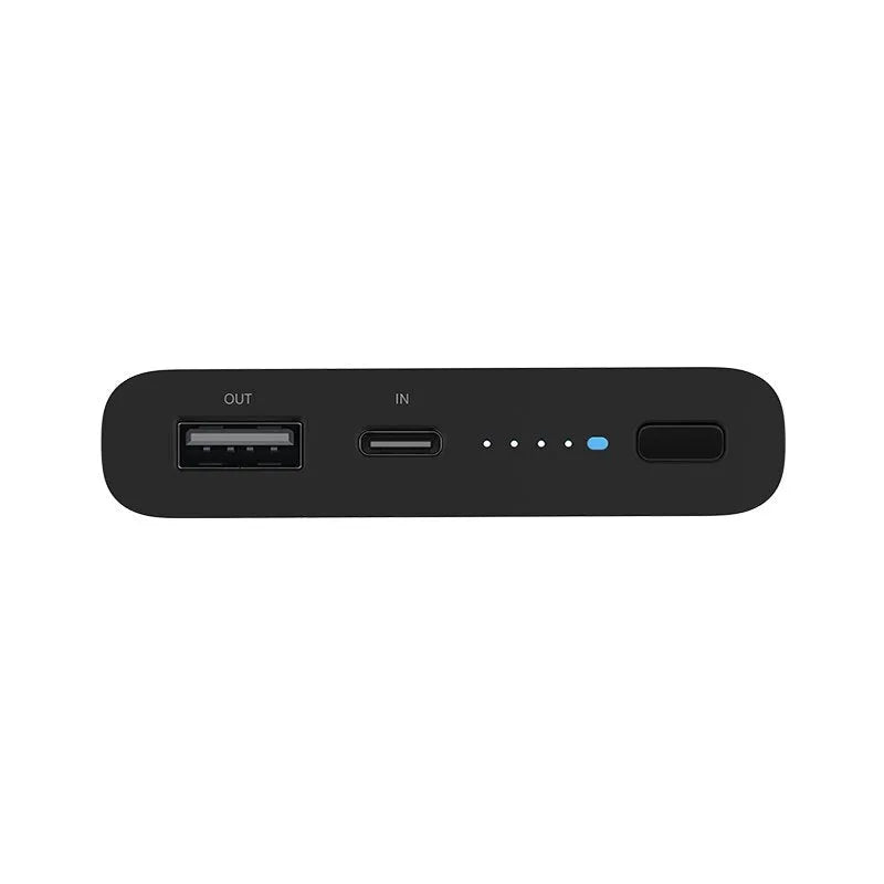 White and black 10000mAh portable power bank with USB-C and USB-A ports for fast and wireless charging.