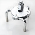 Round three-jaw oil filter wrench with frosted surface treatment and metric system listing, silver colour option