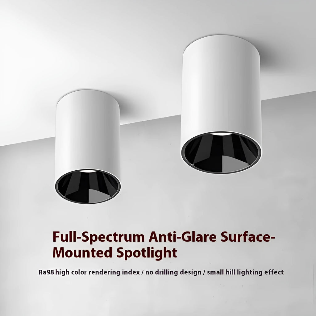 LED surface mounted spotlight in aluminium with anti-glare design, shown in all-black or white and black finish