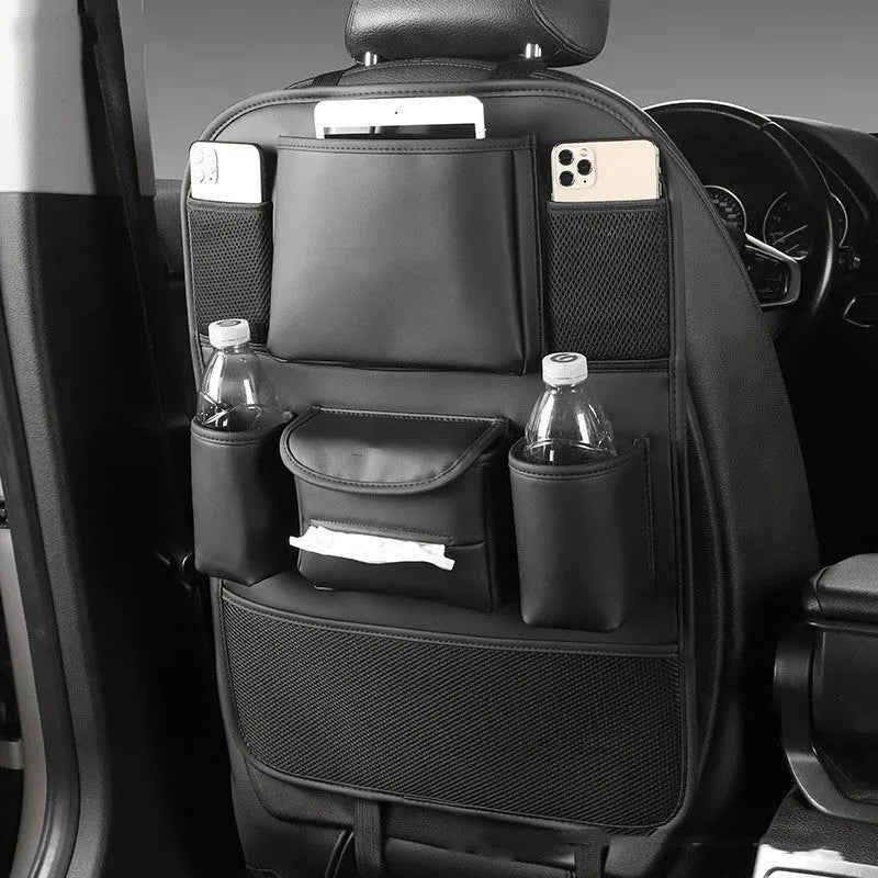 Leather car seat back storage bag mounted behind a car seat in a choice of black, brown, green, or grey.