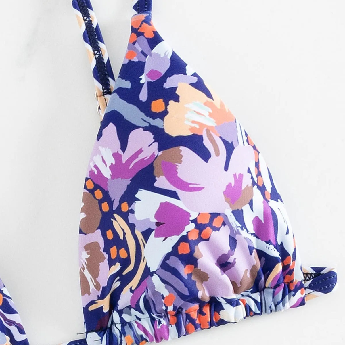 Women's floral print polyester bikini swimsuit with triangle cup top and briefs style bottoms