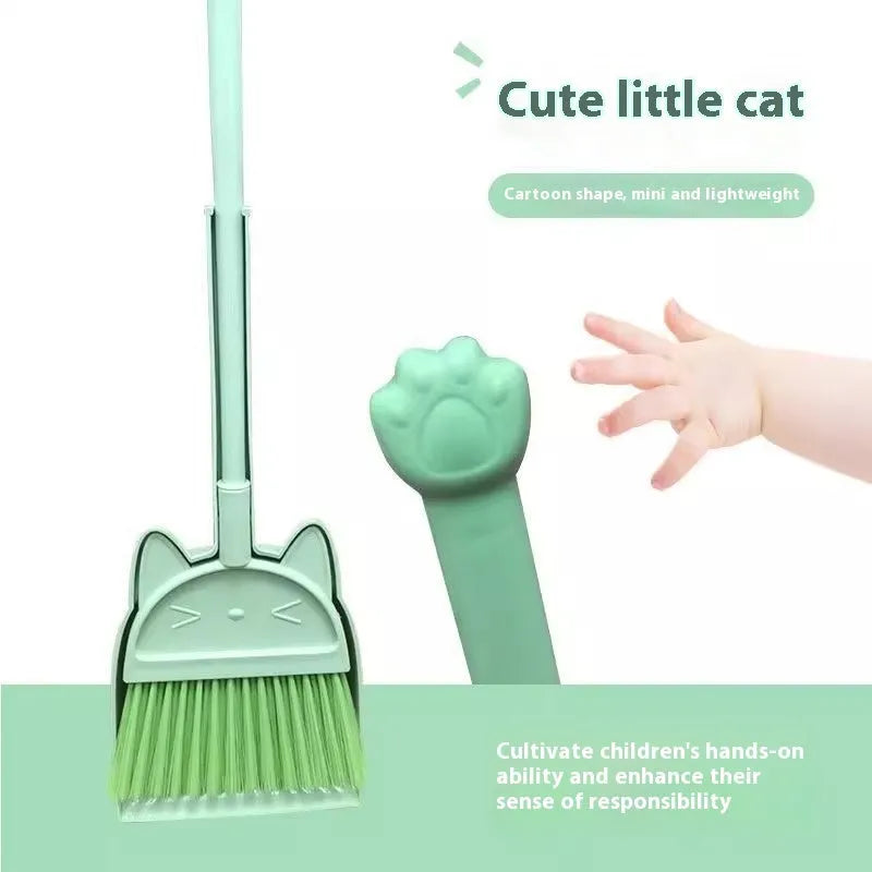 Purple broom and dustpan set with rotating brush holder on white background
