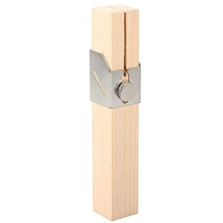 Plastic bottle cutter in log colour on a table showing its compact 2.2cm width and 14cm length