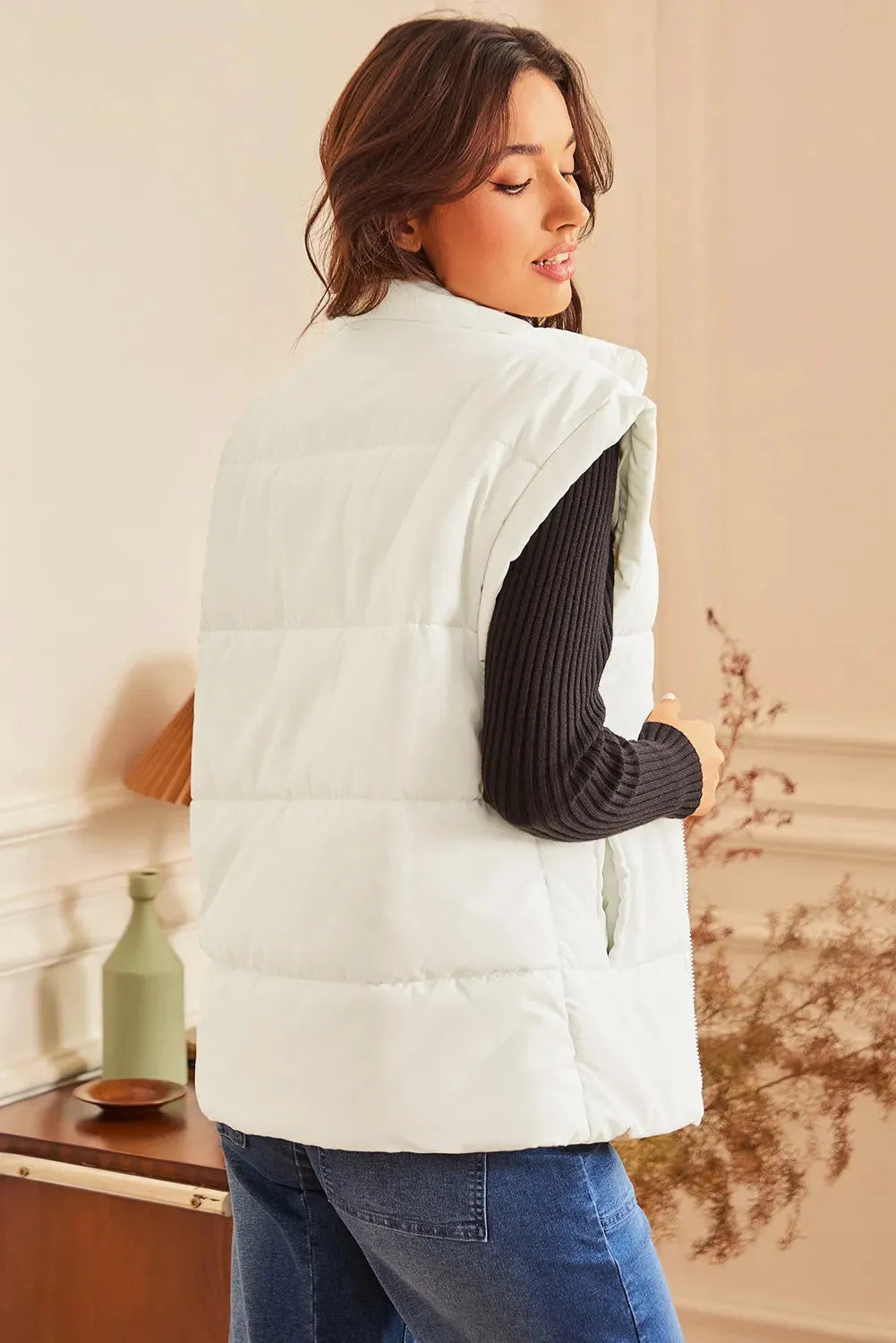 Beige oversized puffer vest with zip front and stand neck, 100% polyester, sizes S to 2XL