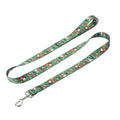 Christmas red polyester dog collar and hand holding rope set on a festive background