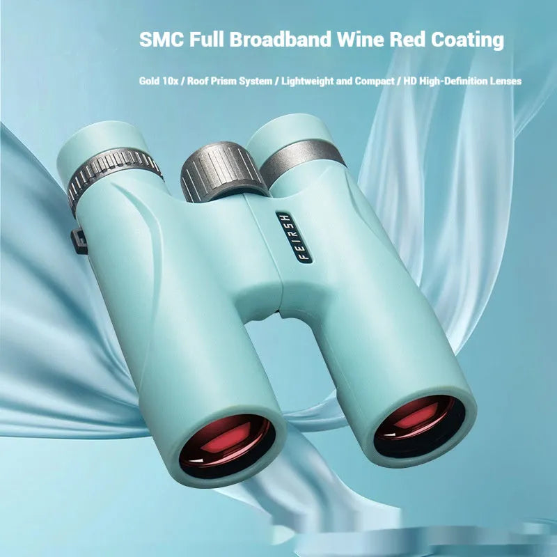 Blue or grey 10x32 plastic binoculars with wine red film imaging lenses on a flat surface.