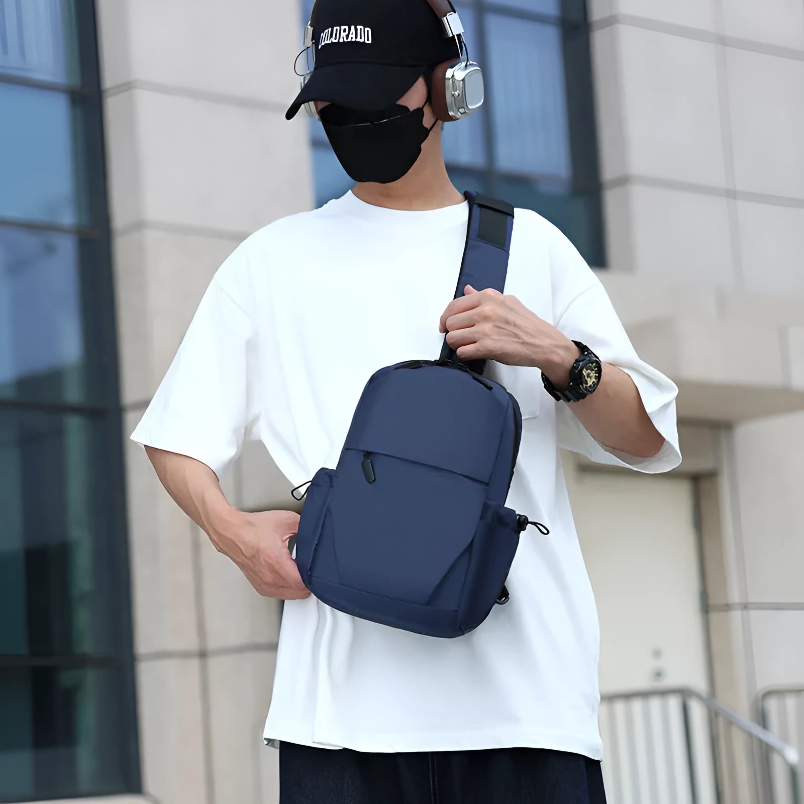 Men's grey waterproof polyester chest bag showing 33cm height dimension