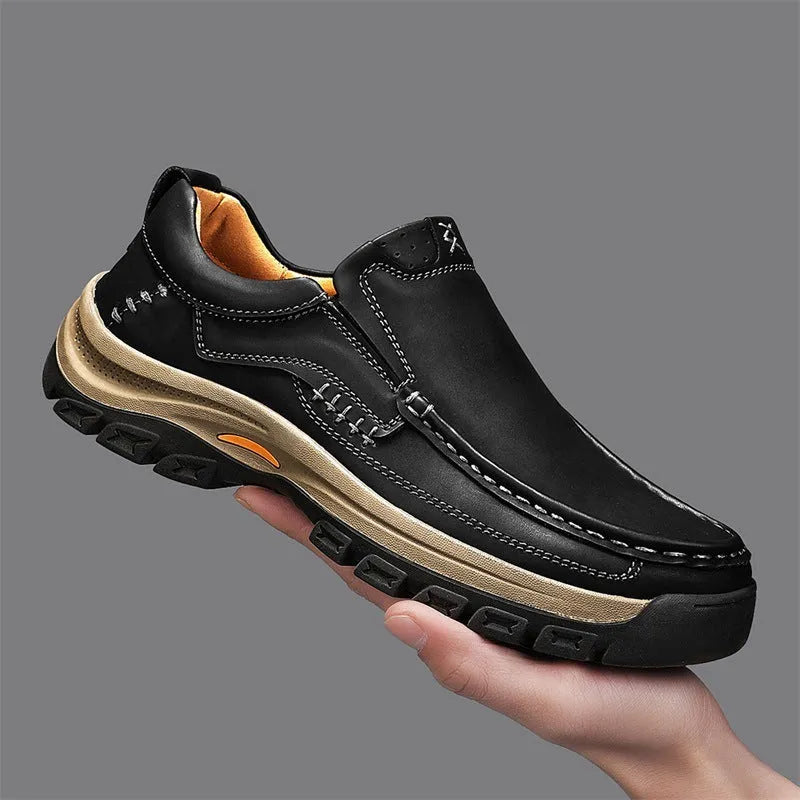 Men's black leather mountaineering shoes with thick rubber sole and round toe