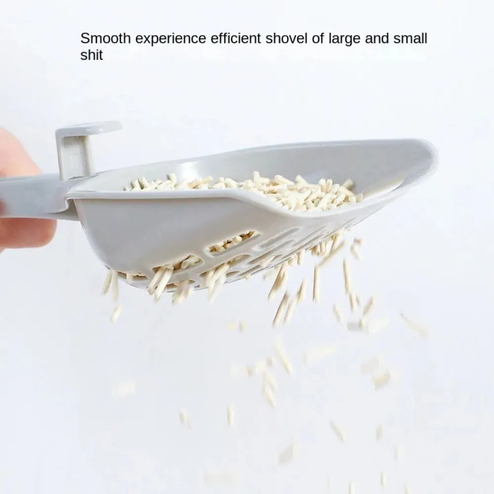 Grey plastic cat litter scoop with attached base for cleaner waste removal