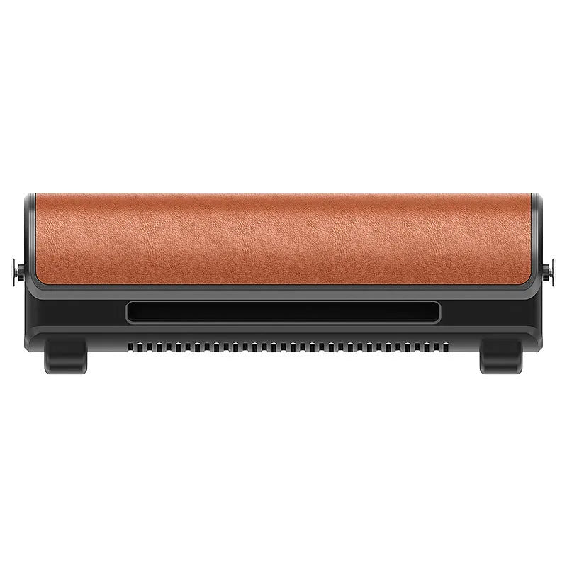 Compact black bladeless car ventilation fan with USB cable on a car dashboard.