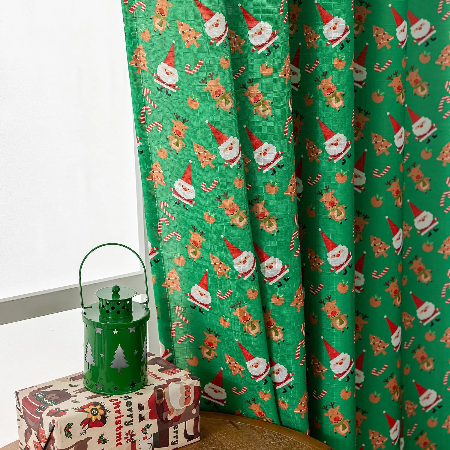 Christmas curtain with snowman and angel cartoon print in green colour, 1 metre width