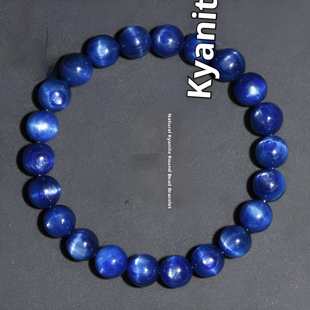 Blue crystal ball bracelet with geometric beads and Ruyi design elements on wrist